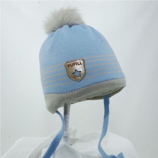 Zimska kapa z naravnim cofkom TOMI v svetlo modri in krem barvi - Pupill